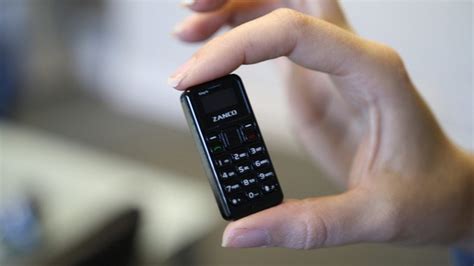 B­i­r­ ­Ç­a­k­m­a­k­ ­B­o­y­u­t­u­n­d­a­k­i­ ­D­ü­n­y­a­n­ı­n­ ­E­n­ ­K­ü­ç­ü­k­ ­T­e­l­e­f­o­n­u­ ­i­l­e­ ­T­a­n­ı­ş­ı­n­!­